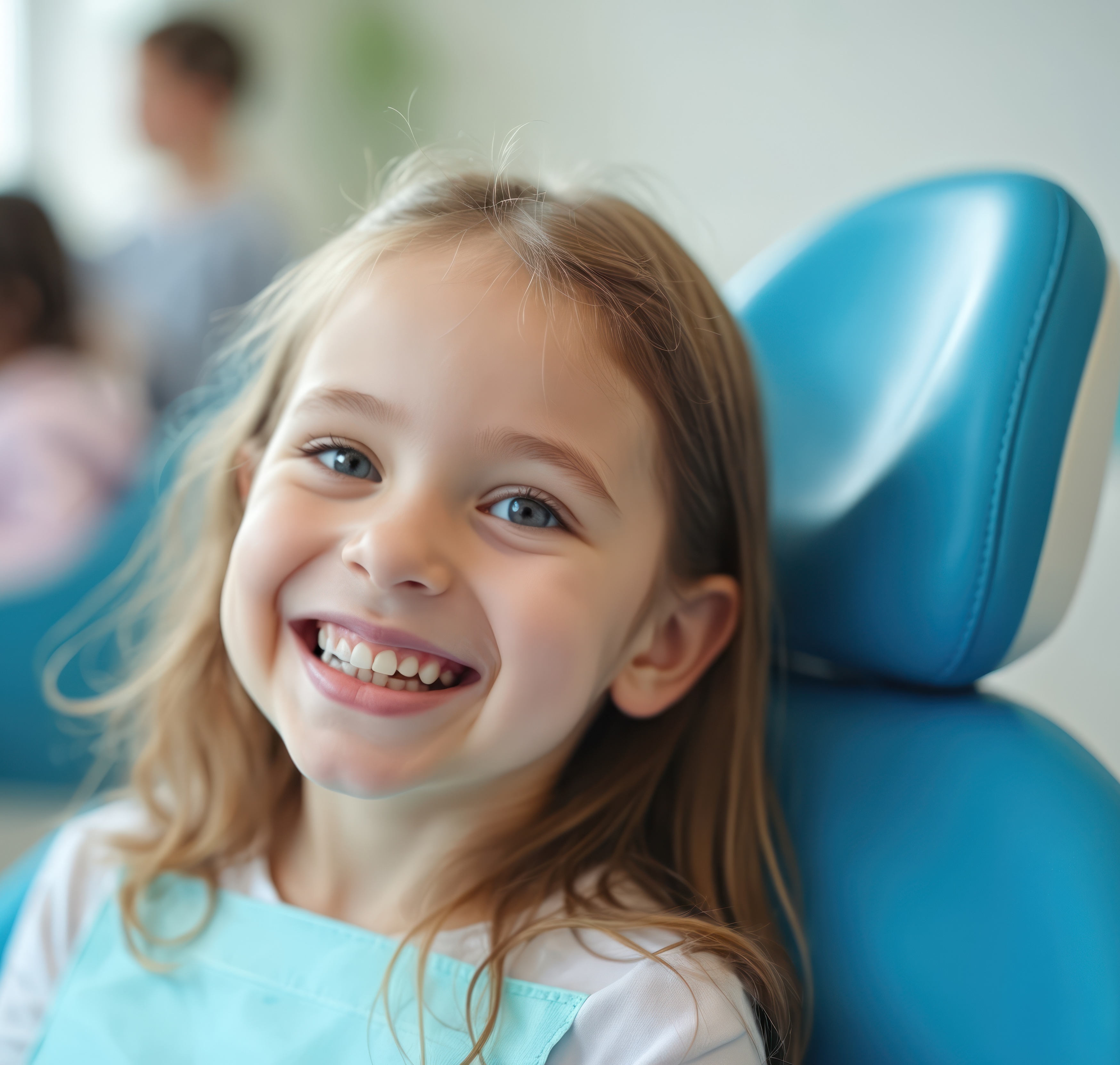 Happy young patient smiling during dental visit, showing comfortable dental care experience
